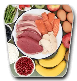 Assorted vitamin B-rich foods including meat, eggs, fish, and bananas
